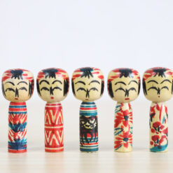 4 Miniature Kokeshi Dolls