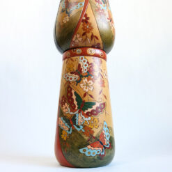 Floral Decorations On A Kokeshi Doll By Ishimura