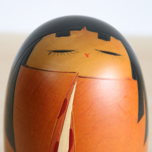 Sato Suigai Orange Vintage Kokeshi Doll Face