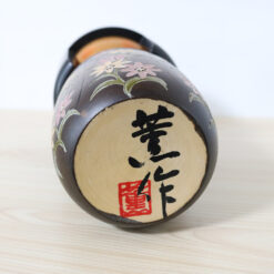 Signature Of Kaoru Nozawa On A Kokeshi Doll